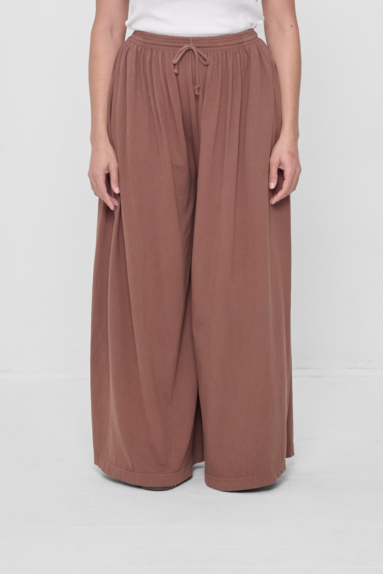 Waist down front view of Potting Soil Tubular Pants on 5'4" model.