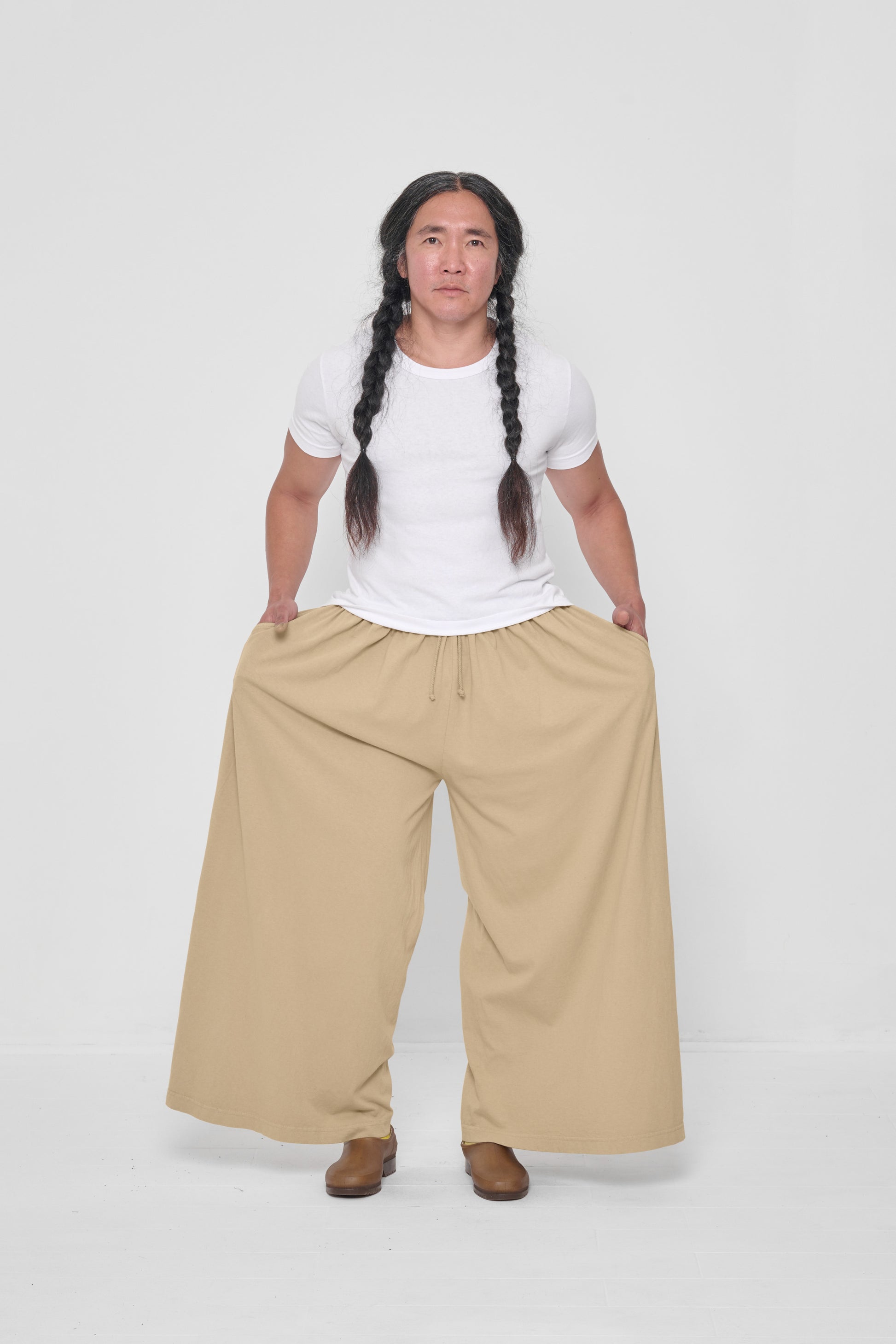 Styled with White Tailored Trash Tee and Plasticana Gardana Clogs. 