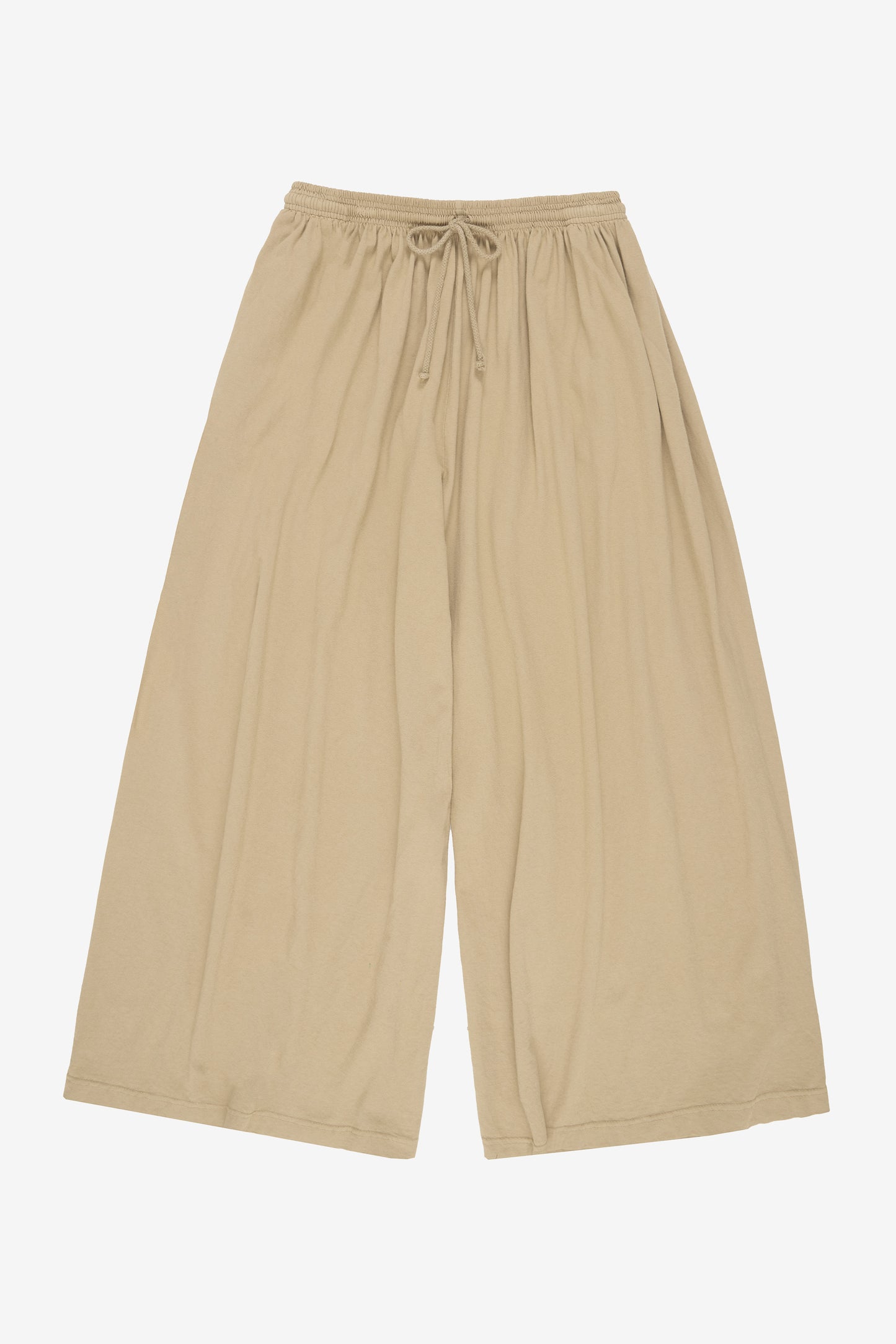 Flat lay: pant legs smoothed out, showing pant leg opening is as wide as the waistband.