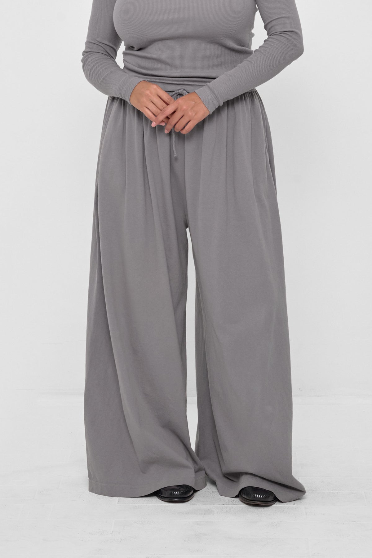 Tubular Pants in Stone – front view on model