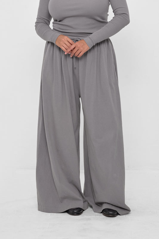 Tubular Pants in Stone – front view on model