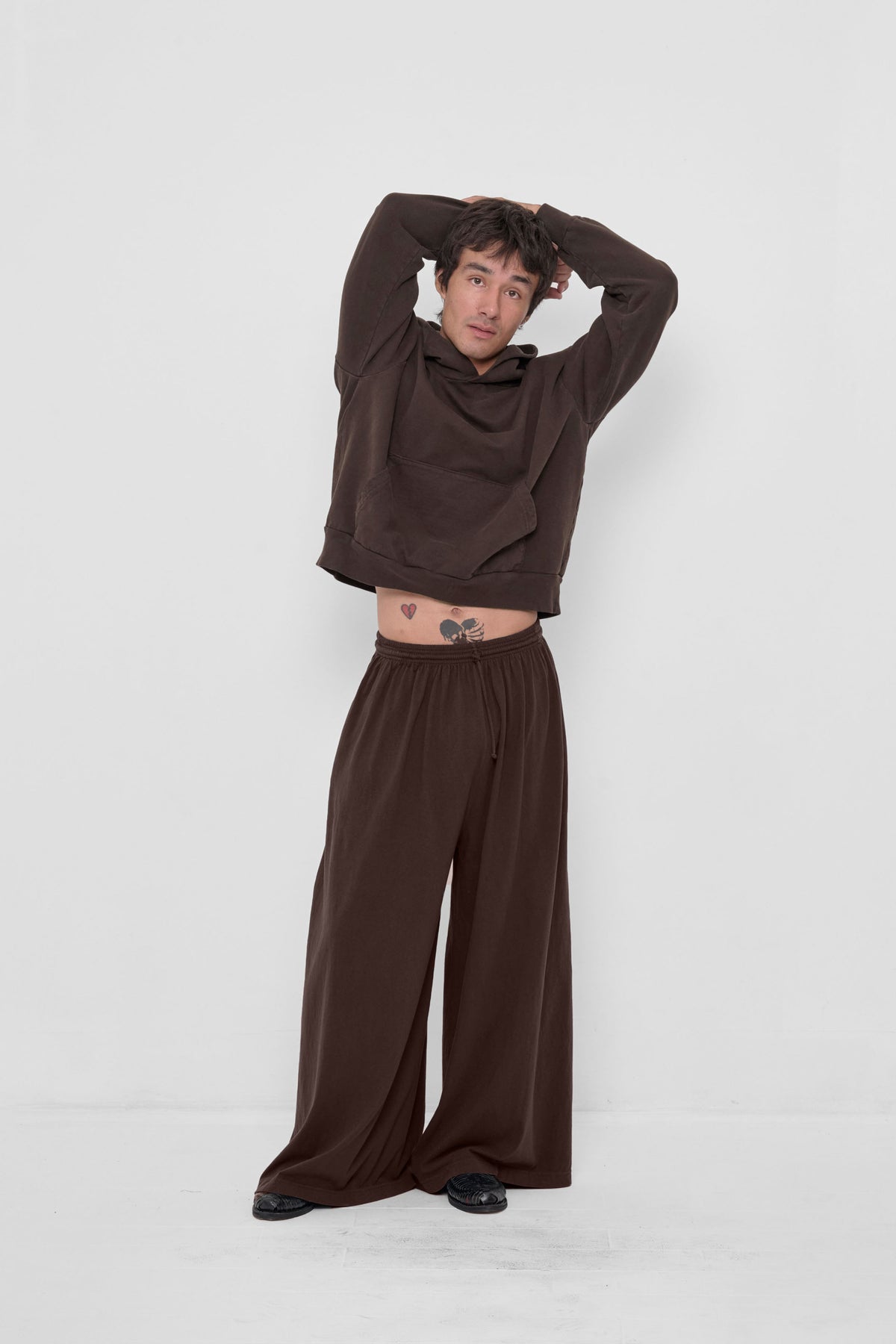 Tubular Pants in Wet Soil – front view on model, styled with matching Trash Hoodie