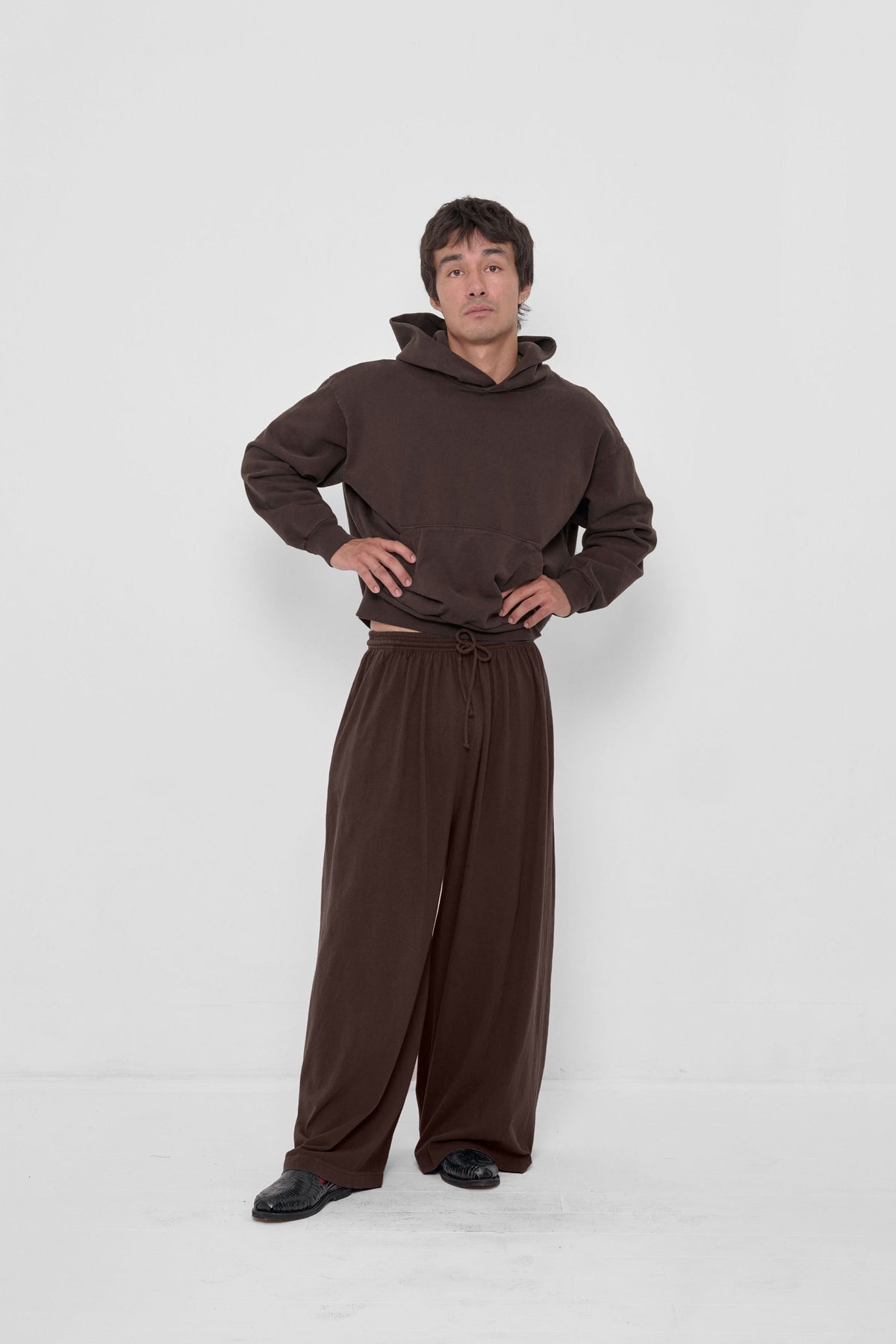 Tubular Pants in Wet Soil – front view on model, styled with matching Trash Hoodie
