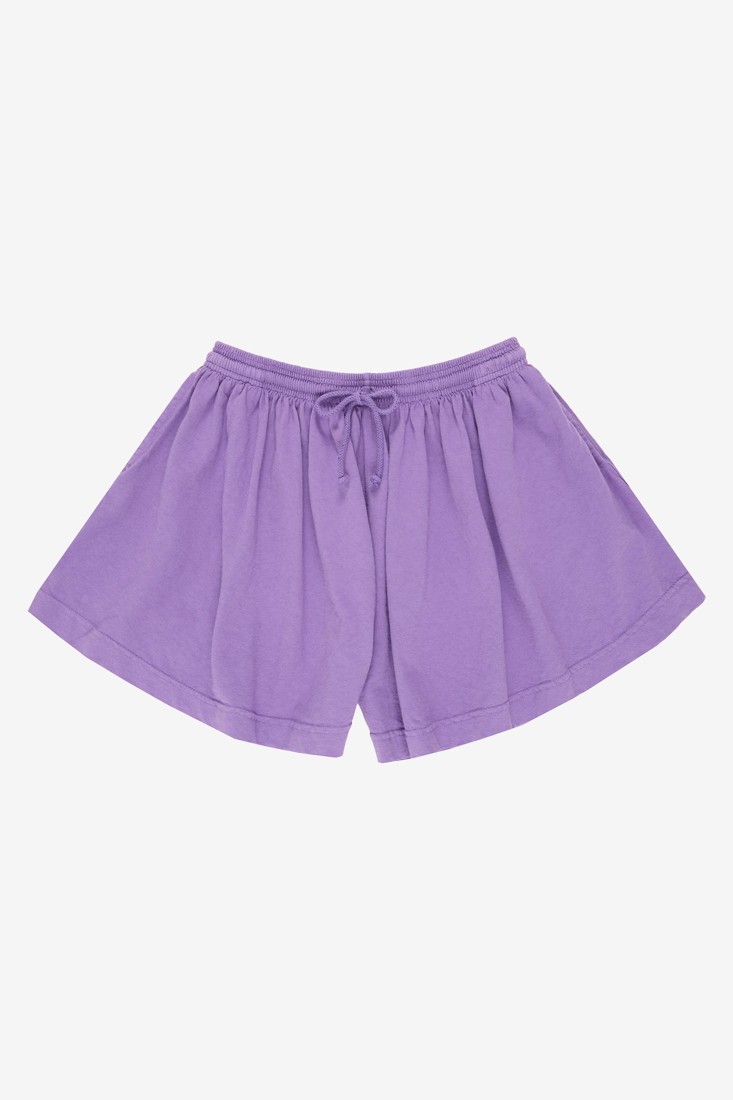 Flat lay: shorts legs smoothed out, showing leg opening is as wide as the waistband.