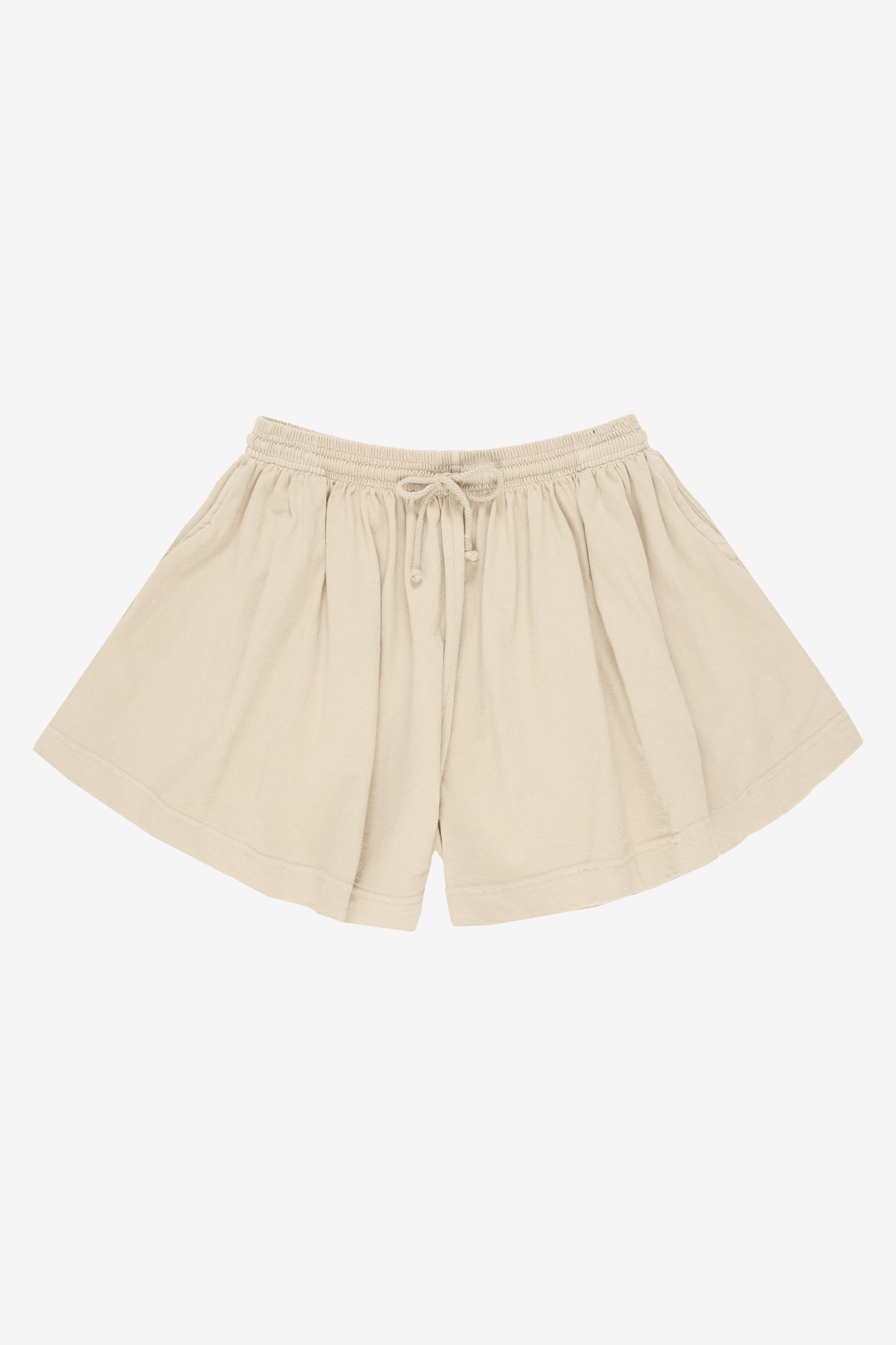 Flat lay: shorts legs smoothed out, showing leg opening is as wide as the waistband.