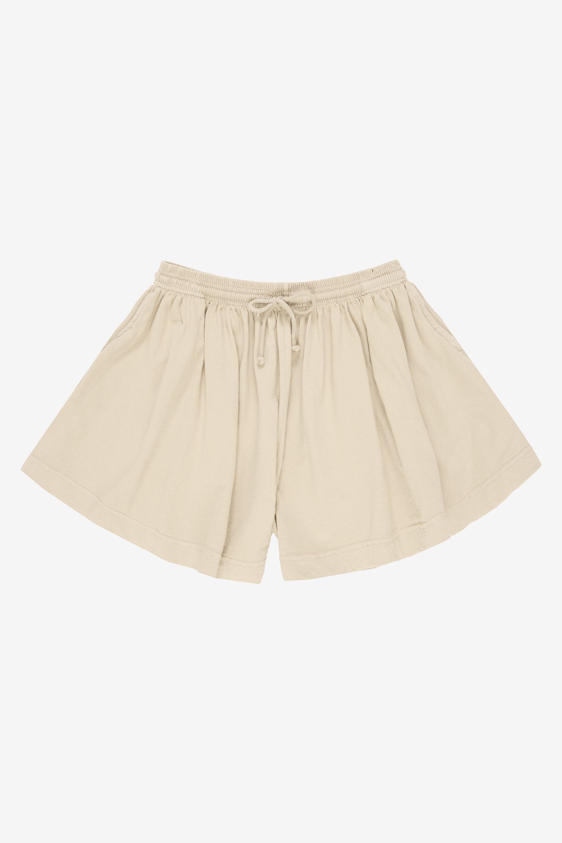 Flat lay: shorts legs smoothed out, showing leg opening is as wide as the waistband.