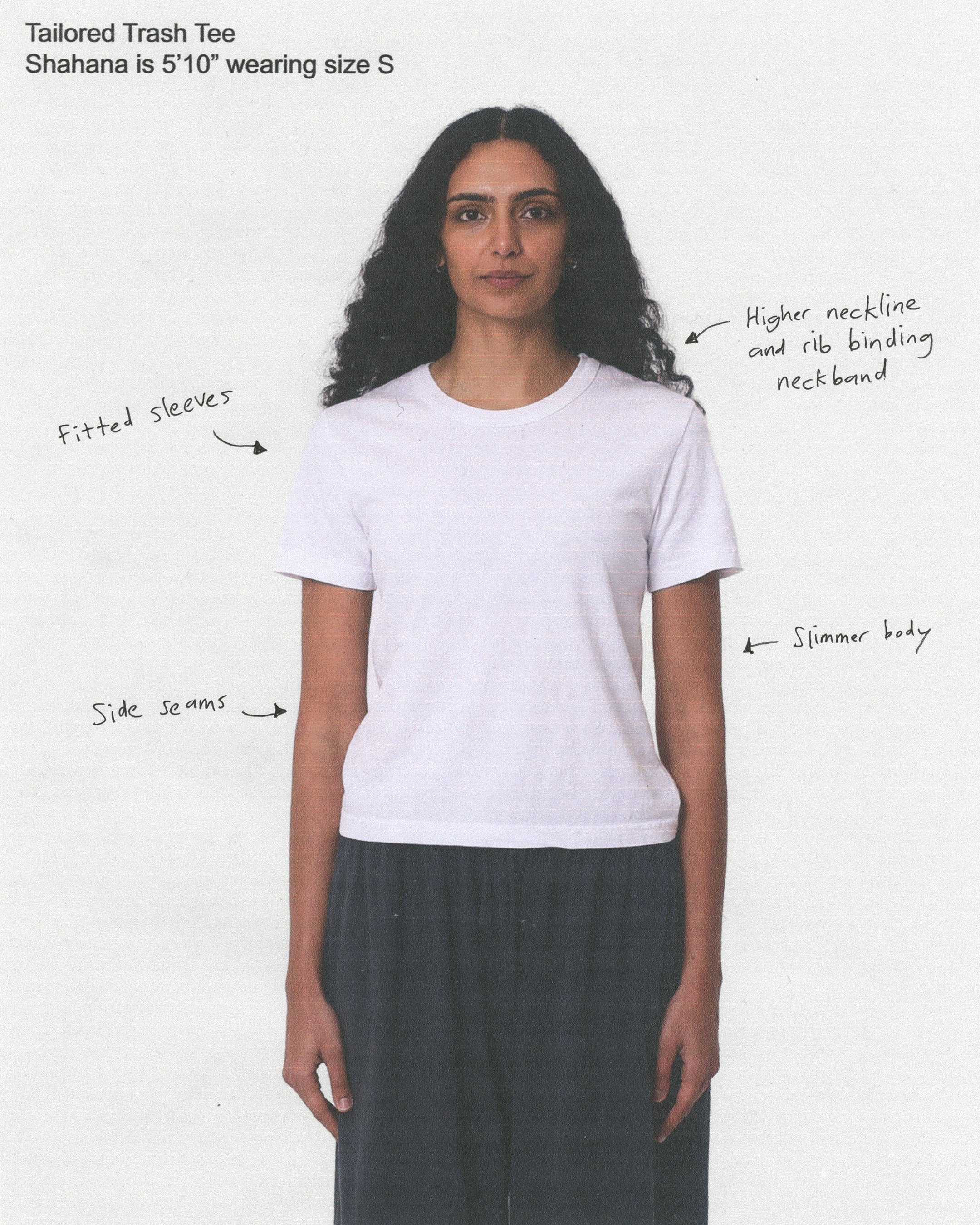 Tailored Trash Tee. Annotated to describe fitted sleeves, high neckline with rib binding neckband, side seams, and slim body.