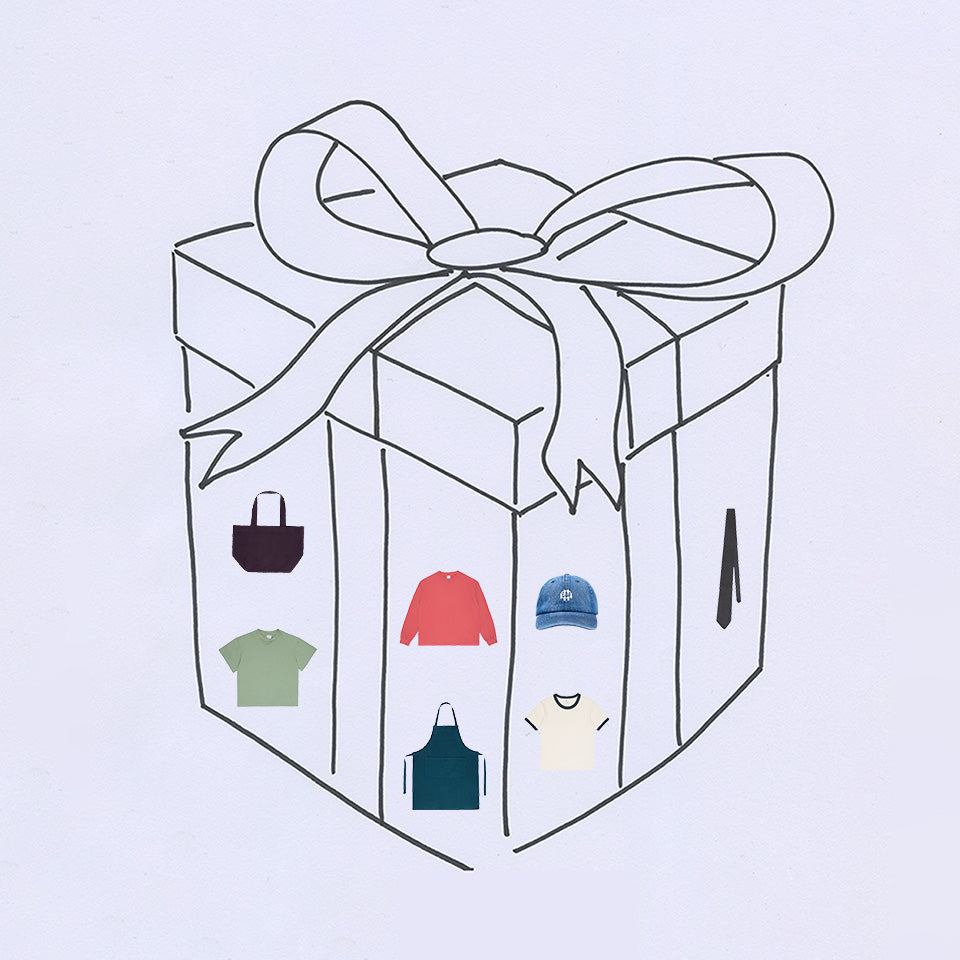 Drawing of a present with images of Everybody.World pieces inside.